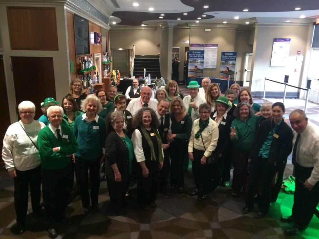 volunteers in st patricks day attire group shot