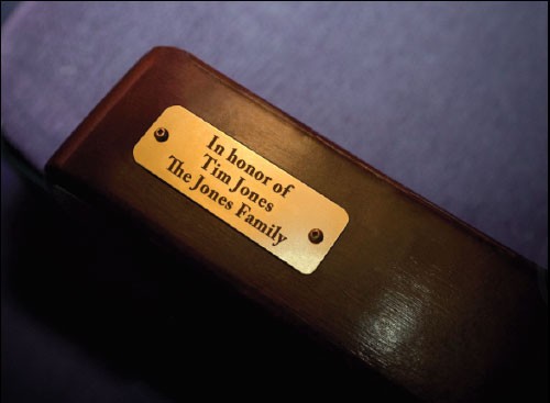 Seat in the Spotlight, name plaque on seat armrest