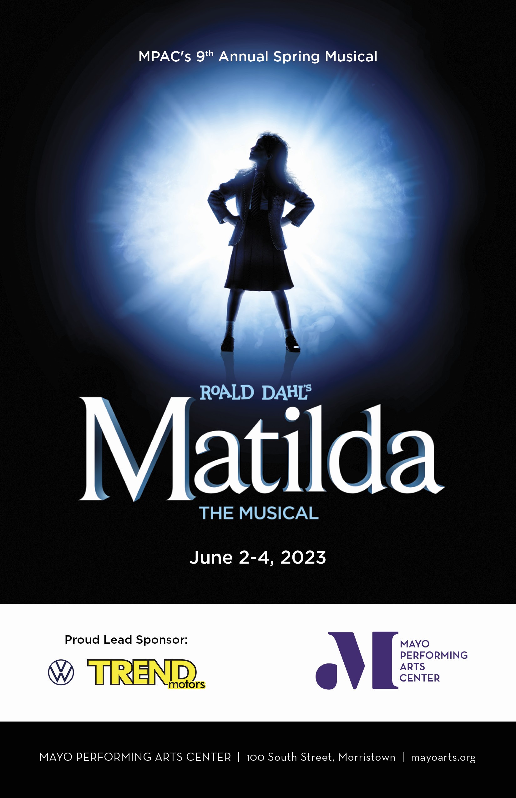 Matilda The Musical Program Book Cover. A young girl wearing a school uniform is backlit by a magical halo of light. Her stance is strong and defiant. Show presented by Mayo Performing Arts Center, and sponsored by Trend Motors.